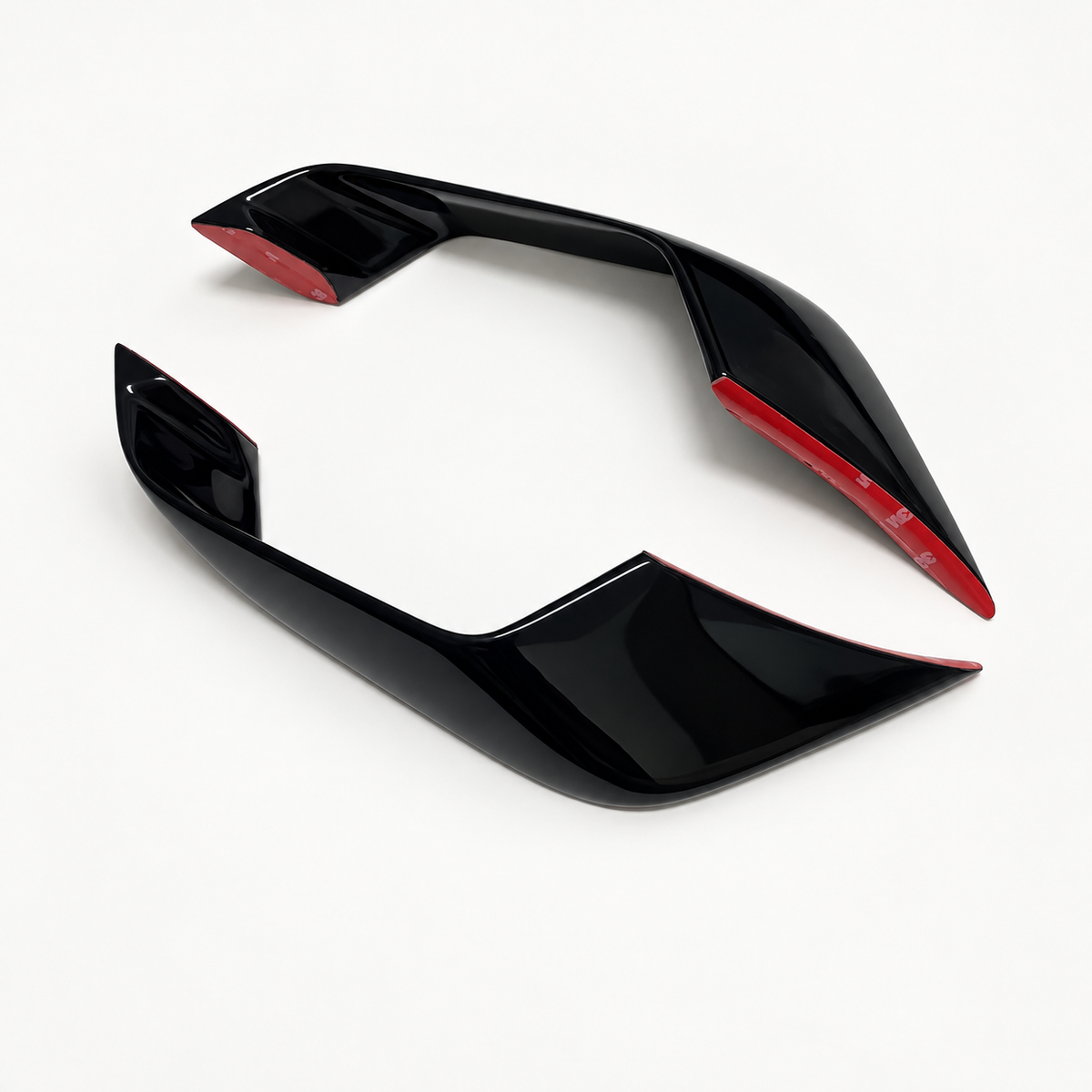YZF-R7 front winglet pair showing glossy black exterior and adhesive-backed mounting faces