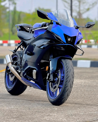 Three-quarter view of front winglets installed on a blue Yamaha R7